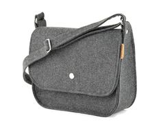 This frelt saddle bag is designed and made in my small studio. It is made out of very durable technical felt, 4mm thick. The handbag is medium size. The bag is really well made. (crossbody felt minimalist purse with the flap, long strap medium size gray felted handbag, grey shoulder bag, gift for her). Measurements: width 28 cm/ 11 inch depth 10 cm/ 3 inch height 22 cm/ 10.5 inch long strap with lenght edjustment 145cm/57 inch. - magnet closure, - 1 zippered pocked inside the bag, - 1 small pock Minimalist Purse, Felted Handbags, Bag Minimalist, Grey Shoulder Bag, Best Purses, Felt Diy, Felt Fabric, Saddle Bag, Microfiber Cloth