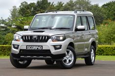 the front view of a silver four door suv