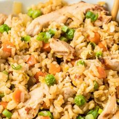 chicken and rice dish with chopsticks in bowl