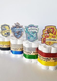 several rolls of toilet paper with harry potter logos on them