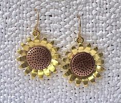 The sunflower on these beautiful earrings is a total of 1 inch in diameter and are made of a tin metal that shows off the vibrant sunflower colors.           Shipping is free and mailed within 1 business day from Scottsdale, Az. Sunflower Design Drop Earrings For Summer, Bohemian Summer Jewelry With Sunflower Design, Bohemian Sunflower Design Jewelry For Summer, Bohemian Sunflower Design Summer Jewelry, Vintage Round Earrings For Summer, Bohemian Sunflower Drop Earrings, Bohemian Sunflower Jewelry For Gift, Bohemian Sunflower Jewelry As Gift, Vintage Jewelry As Summer Gift