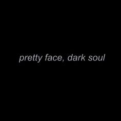 the words pretty face, dark soul written in white on a black background