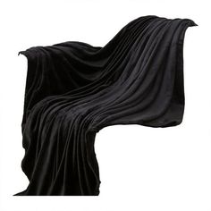 an image of a black blanket on top of a white background with the words,'it