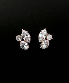 Rose gold plated metal setting three shapes clear white AAA quality cubic zirconia post earrings. Sterling silver post. Available in rhodium silver or gold finish. I offer discounts on bulk qty. Please inquire. Thank you. Size: 1.7cm x 1.2cm https://www.etsy.com/listing/523164418/bridal-jewelry-bracelet-prom-wedding?ref=listings_manager_grid https://www.etsy.com/listing/269941625/wedding-jewelry-bridal-necklace-prom?ref=listings_manager_grid Bridal Jewelry Bracelets, Jewelry Prom, Earrings Bridesmaid, Marquise Cut Diamond, Bridal Necklace, Bridesmaid Earrings, Rose Gold Earrings, Wedding Bracelet, Bridesmaid Jewelry