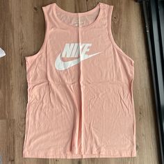 Nike Tank Size L Salmon Color ***Nwot, Great Condition. No Flaws*** Sleeveless Cotton Nike Top, Nike Cotton Tank Top For Workout, Nike Cotton Workout Tops, Nike Casual Cotton Tank Top, Nike Basic Summer Tops, Nike Casual Pink Tank Top, Casual Nike Pink Tank Top, Casual Pink Nike Tank Top, Nike Casual Tank Top For Summer