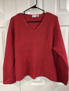 habitat size M/L Red Cotton knit, V-neck sweater, long sleeves. Length is 22 inches, armpit to armpit is 23 inches, shoulder to shoulder is 19 inches. Winter Knit V-neck Sweater, Red V-neck Knit Cardigan, Red Knit V-neck Cardigan, Cozy Red V-neck Top, Red Long Sleeve V-neck Sweater For Winter, Red Textured Knit Long Sleeve Cardigan, Red Long Sleeve Textured Knit Cardigan, Red Long Sleeve Cardigan With Textured Knit, V Neck Knit Sweater