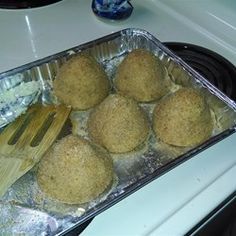 some food that is sitting in a pan on the stove