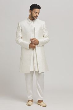 White sherwani with thread quatrefoil embroidery. Paired with an inner embroidered kurta and pant. - Aza Fashions Elegant Nehru Jacket For Traditional Ceremonies, Elegant Nehru Jacket For Diwali Ceremonies, Elegant Kurta With Traditional Fit For Ceremonies, Elegant Traditional Fit Kurta For Ceremonies, Elegant Nehru Jacket For Eid And Traditional Ceremonies, Elegant Nehru Jacket For Eid Ceremonies, Fitted Nehru Jacket With Chikankari For Traditional Ceremonies, Fitted Nehru Jacket With Chikankari Embroidery For Traditional Ceremonies, Open Sherwani Men