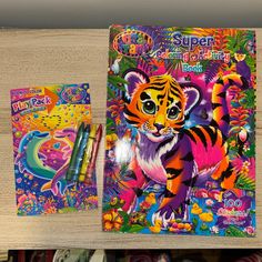 a colorful tiger coloring book next to a crayon pencil