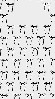 black and white image of bows on a sheet of paper