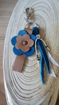 a key chain with a flower on it