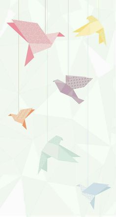 colorful origami birds hanging from strings against a white background with low poly shapes