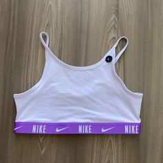 Nike Kids Sports Bra Never Worn Size Xl Fits Like A Women’s Small (E) White Cotton Sleeveless Sports Bra, White Sleeveless Activewear For Loungewear, White Sleeveless Loungewear Activewear, White Medium Support Tops For Loungewear, White Tops For Loungewear With Medium Support, White Medium Support Top For Loungewear, Stretch Cotton White Sports Bra, Casual White Sports Bra For Light Exercise, White Cotton Activewear For Training