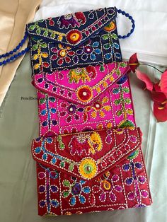 Handmade Embroidery Small Colorful Sling bag. Red Rectangular Clutch For Festivals, Handwork Red Shoulder Bag As Gift, Red Shoulder Bag As Festival Gift, Red Shoulder Bag For Festivals As Gift, Red Shoulder Bag For Festivals, Red Shoulder Bag For Festivals And Gifts, Handmade Red Pouch, Festival Rectangular Bags With Multicolor Embroidery, Embroidered Red Pouch Clutch