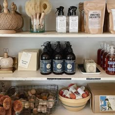 the shelves are filled with different types of soaps