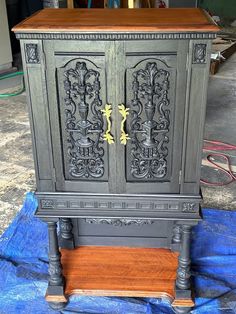 an old cabinet is being worked on