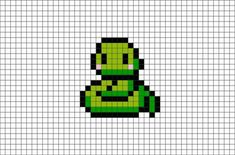 a pixellated image of a green alien sitting on top of a white sheet with black dots