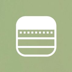 a green background with a white square icon on the bottom right corner and horizontal lines in the middle