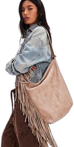 Trendy Brown Hobo Bag With Fringe, Chic Daily Use Bucket Bag With Tassels, Chic Beige Fringe Bag, Chic Brown Fringe Hobo Bag, Chic Beige Fringe Shoulder Bag, Chic Rectangular Fringe Shoulder Bag, Trendy Beige Shoulder Bag With Fringe, Chic Fringe Bags For Fall, Chic Fringe Hobo Bag For Travel