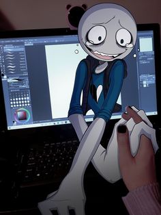 a cartoon character is sitting in front of a computer screen and holding onto the keyboard