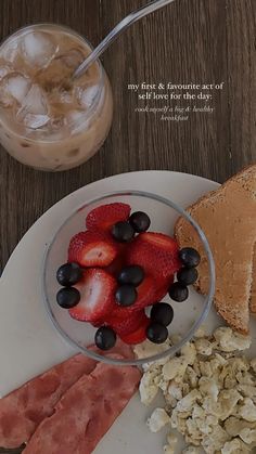 the breakfast is ready to be eaten on the table with milk, fruit and toast