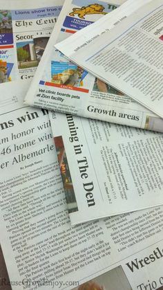 several newspapers laying on top of each other with the same paper in front of them