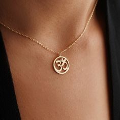 "Looking for a simple piece that you can wear to yoga, or just simply around town to feel that \"zen\" everywhere you go? This Om Aum pendant is a classic and includes a durable chain, so that wherever you choose to sport it, it will last and make a positive impression. This necklace also makes the perfect gift for a friend or loved one. MATERIAL * Material: High Quality Solid 925 Sterling Silver,  * Finish: Sterling Silver ∙ 18K Gold ∙ Rose Gold * Chain length: adjustable  GIFT BOX * Each order Om Aum, Om Necklace, Yoga Necklace, Elephant Necklace, Chic Gifts, Yoga Jewelry, Spiritual Jewelry, Custom Necklace, Dainty Jewelry