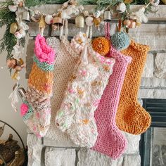 three knit stockings hanging from a fireplace with the words, he's fine day wednesday