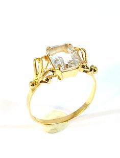 Vintage gold ring with faceted Rock Crystal, by Guldvaruhuset Ab,  made of 18k gold, Stockholm Sweden 1952 The gold ring has in top a faceted Rock Crystal with the size 10mm x 7mm. The ring size is 18.1 ( inner diameter ) according to the ring size chart is this US size 8 and Europe size 57. Hallmarks: GVH / Manufacturer Mark for Guldvaruhuset ( registered from 1923 - 1965 in Stockholm ) Stockholm City Mark 18k for Gold Purity 750 Three Crowns / Sweden National Mark B9 / Sweden Year Mark 1952 Pl Vintage Gold Ring, Vintage Gold Rings, Rock Crystal, Rings Statement, Vintage Gold, Finland, Gold Ring, Statement Rings, Gold Rings