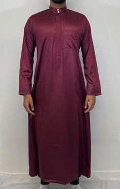 Introducing our Men's Embroidery Collar Thobe, the perfect addition to your Islamic clothing collection. Made from a high-quality mix fibre silky feel fabric, this thobe is not only easy to iron but also incredibly soft and comfortable to wear. The meticulous stitching make this thobe a truly stand-out piece. Available in a wide range of colours and sizes, you're sure to find the perfect fit for your personal style. And for the younger members of your family, we also offer this Saudi thobe in bo Red Long Thobe For Eid, Elegant Red Long Sleeve Thobe, Red Embroidered Thobe For Eid, Formal Long Sleeve Thobe For Eid, Traditional Red Long Sleeve Thobe, Habits Musulmans, Embroidery Collar, Red Embroidery, Islamic Clothing