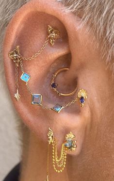 Classy Ear Curation, Curated Ear Piercing Maximalist, Unique Piercing Placement, Gold Earring Set Up, Ear Piercings Vintage, Maxamilist Ear Piercings, Silver Hoop Earrings Stack, Rare Ear Piercings