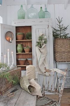 an old wooden table and chairs in a room