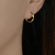 Size: 11 mm Inner Diameter, 13.5 mm Outer Diameter Material: 14k Solid Gold Color: Yellow Gold All jewelry comes in a gift-ready box. Customers can request a greater quantity or 14k rose gold. Modern Twist Hoop Earrings As Gift, Hypoallergenic Hoop Earrings With A Modern Twist, Modern Twist Tarnish Resistant Huggie Earrings, Minimalist Twisted Hoop Earrings As Gift, Minimalist Twisted Hoop Earrings For Gift, Everyday Twisted Hoop Earrings, Small Gold Hoop Earrings, Dainty Hoop Earrings, Medium Hoop Earrings