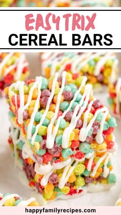 easy cereal bars with white icing and rainbow candies on top, stacked together