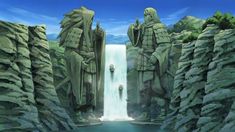 two statues standing in front of a waterfall