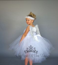 "Halloween Costume, Baby girls dress, Kids dress, Tween dress, Long Tutu Dress, Little Girls Tulle Dress, Kids Tutu Dress, Baby Girls Dress, Toddler Skirt, Infant Skirt, Adult Long Skirt, Wedding Flower Girl Skirt, Full Length Tulle Skirt, Wedding Tutu, Petticoat, Floor length skirt This dress is a beautiful full tulle dress made onto a sewn elastic waistband. This dress is unlined, so a slip, shorts, or leggings may be worn underneath if desired. Headband can be added through the drop down menu Christmas Tulle Princess Dress For Fancy Dress, Fitted Christmas Tutu Dress For Fancy Dress, Fitted Tutu Dress For Christmas Fancy Dress, Fitted White Fairytale Fairy Dress, White Fairytale Fairy Dress For Parties, White Fitted Fairy Dress, White Tulle Christmas Dress, Fairytale Tulle Tutu Dress For Fancy Dress Occasions, Fairytale Tulle Tutu Dress For Fancy Dress