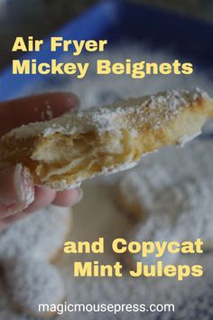 a close up of a person holding a piece of food with the words air fryer mickey beignets and copycat mint jukes