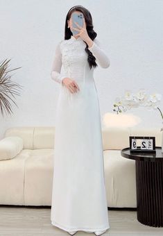 ✨This set includes: the women ao dai with matching pants. ✨If you order a pre-made size, please see size chart below for measurements of available pre-made sizes. A pre-made size is available and shipped within 1-3 business days. ✨We also take custom-made order to your measurements. Processing time for custom-made order is approximately 4-8 WEEKS: - Orders placed and measurements sent by the end of each month will be ready to ship by the end of the following month. - FOR EXAMPLE: - If we receive Fitted White Ao Dai For Ceremonies, Traditional White Ao Dai For Party, Traditional White Ao Dai For Wedding, Long White Dress For Ceremony, White Long Dress For Ceremony, White Fitted Ao Dai For Wedding, Elegant Ao Dai For Wedding, Full Length Fitted Ao Dai For Wedding, Elegant Long White Ao Dai