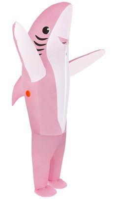 an inflatable pink shark standing upright