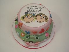 a birthday cake with two people on it sitting on a white counter top, and the words'this is actually ella's 3rd birthday's day