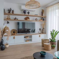 the living room is clean and ready to be used as a entertainment center for entertaining