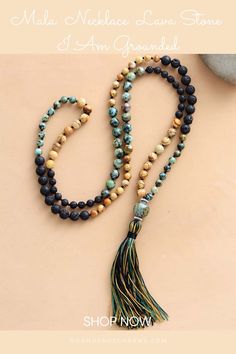 Mala Beads Necklace Lava Stone I Am Grounded. Gorgeous mala with picture, African turquoise jasper, and lava stone. Inspired by Autumn colors. Get inspired by the meaning of the mala beads and check out our mala necklace collection. Malas and meditation go hand in hand. They help you to enhance your spiritual practices. We offer a great variety of prayer beads, meditation tools, Japa mala 108 beads, and 27. Check our website to see more> Bohemian Brown Mala With Natural Stones, Green Bohemian Necklace With 8mm Beads, Bohemian Agate Mala With Gemstone Beads, Holistic Yoga Jewelry With 108 Beads, Earthy Green Jewelry With 8mm Beads, Nature-inspired Gemstone Beads Jewelry For Meditation, Spiritual Green Crystal Necklaces For Festivals, Green Spiritual Crystal Necklaces For Festivals, Green Spiritual Crystal Necklace For Festival