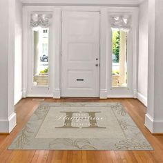 a white door with a welcome mat in front of it