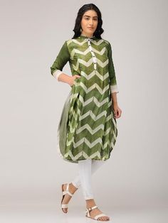 A zigzag shibori dyed chanderi front placket tunic with 3/4th sleeves Features: Olive green-dyed front placket zigzag shibori patterned kurta with 3/4th sleeves Shell - pure cotton silk fabric Box pleats in front with offwhite accents Handmade in India Garment measurements (in Inches): Size XS : Bust-34", Waist-32", Hip-Flared, Shoulder-14", Length-45", Sleeve length-18" Size S : Bust-36", Waist-34", Hip-Flared, Shoulder-14.5", Length-45", Sleeve length-18" Size M : Bust-38", Waist-36", Hip-Flar Zigzag Pattern Kurti, The Secret Label, Fabric Box, Trendy Suits, Cotton Silk Fabric, Shibori Pattern, Shibori Dye, Fashion Design Dress, Dress Indian