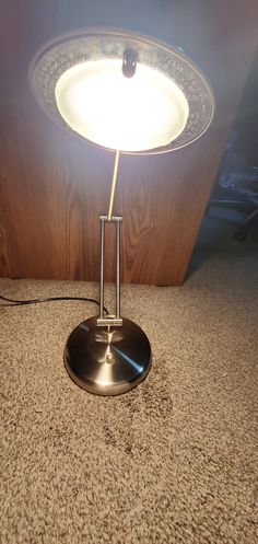 a lamp that is sitting on the floor