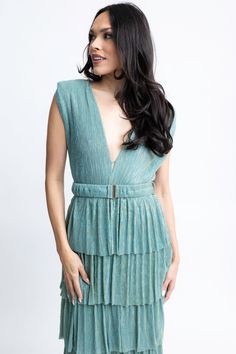 This elegant and eye-catching maxi dress is crafted with metallic detail, a double V-neck and tiered skirt for added drama. Perfect for any stylish event. Green Pleated Sleeveless Maxi Dress, Green Bohemian V-neck Sleeveless Dress, Green V-neck Maxi Dress With Tassels, Casual Turquoise V-neck Maxi Dress, Turquoise V-neck Casual Maxi Dress, White Maxi, White Maxi Dresses, Sweater Blouse, Dress Romper