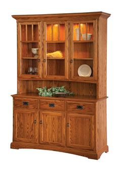 a wooden hutch with glass doors and drawers