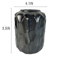 a black vase is shown with measurements for it