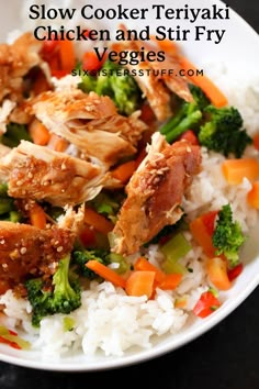 a white bowl filled with rice, broccoli and chicken on top of it