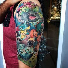 a man with a tattoo on his arm has pokemon characters all over him and is talking on the phone